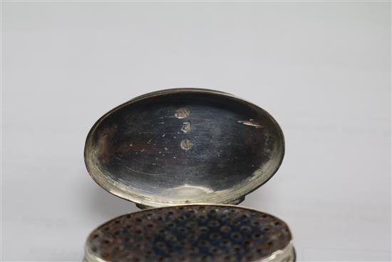 A George III silver oval nutmeg grater by Thomas Wilmore, Birmingham, 1797, 46mm.